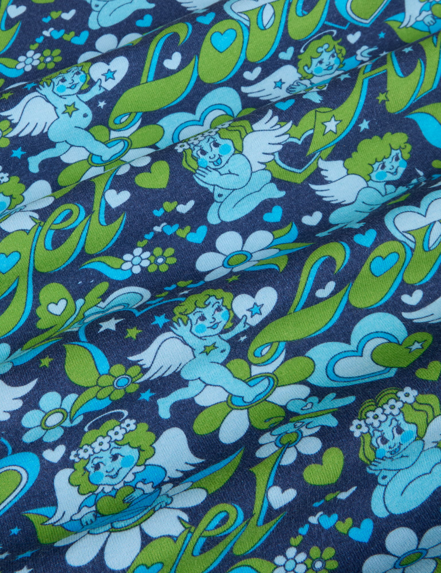 Long Sleeve Baby Tee in Angel Print fabric detail close up