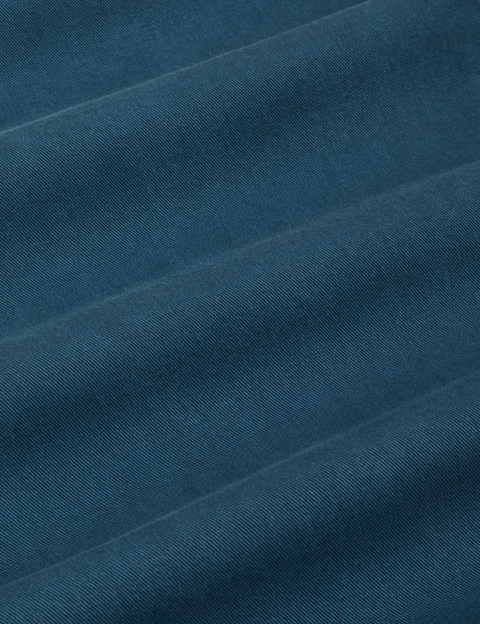 Work Pants in Lagoon fabric detail close up