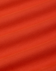 Long Sleeve Baby Tee in Chili Red fabric detail close up