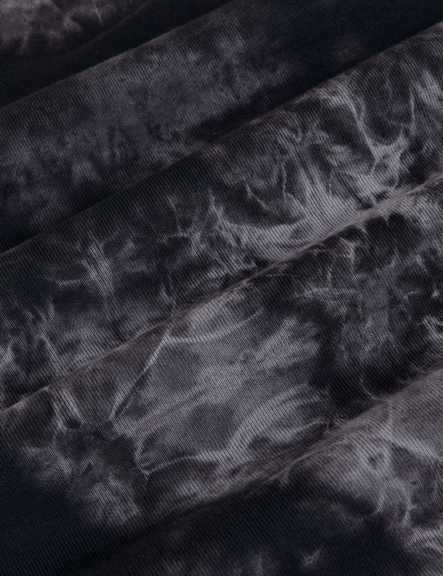 Long Sleeve Baby Tee in Black Magic Waters fabric detail close up