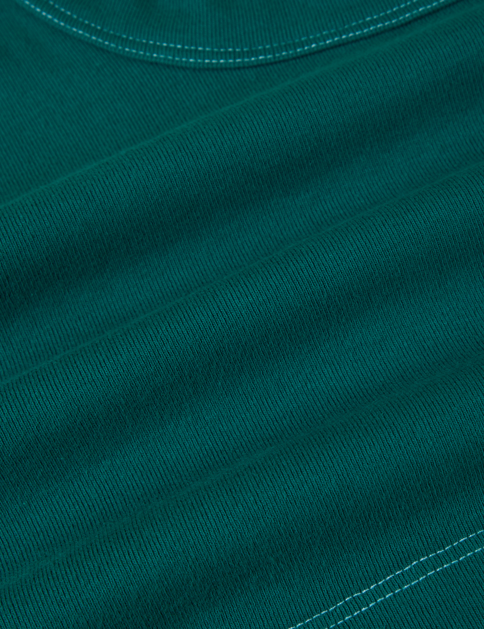 Contrast Stitch Mini Tank in Hunter Green fabric detail close up with white topstitch