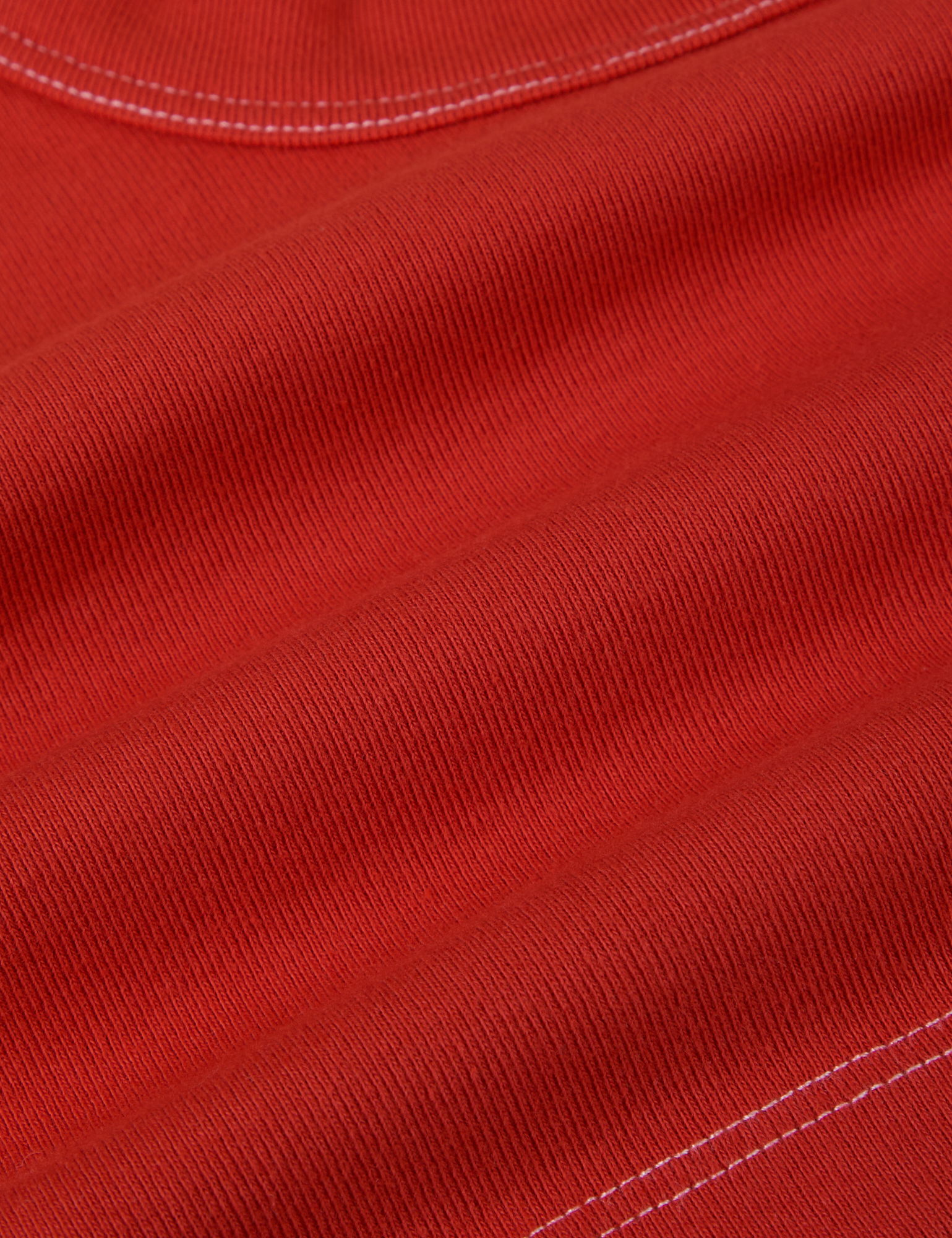 Contrast Stitch Mini Tank in Mustang Red fabric detail close up with white topstitching