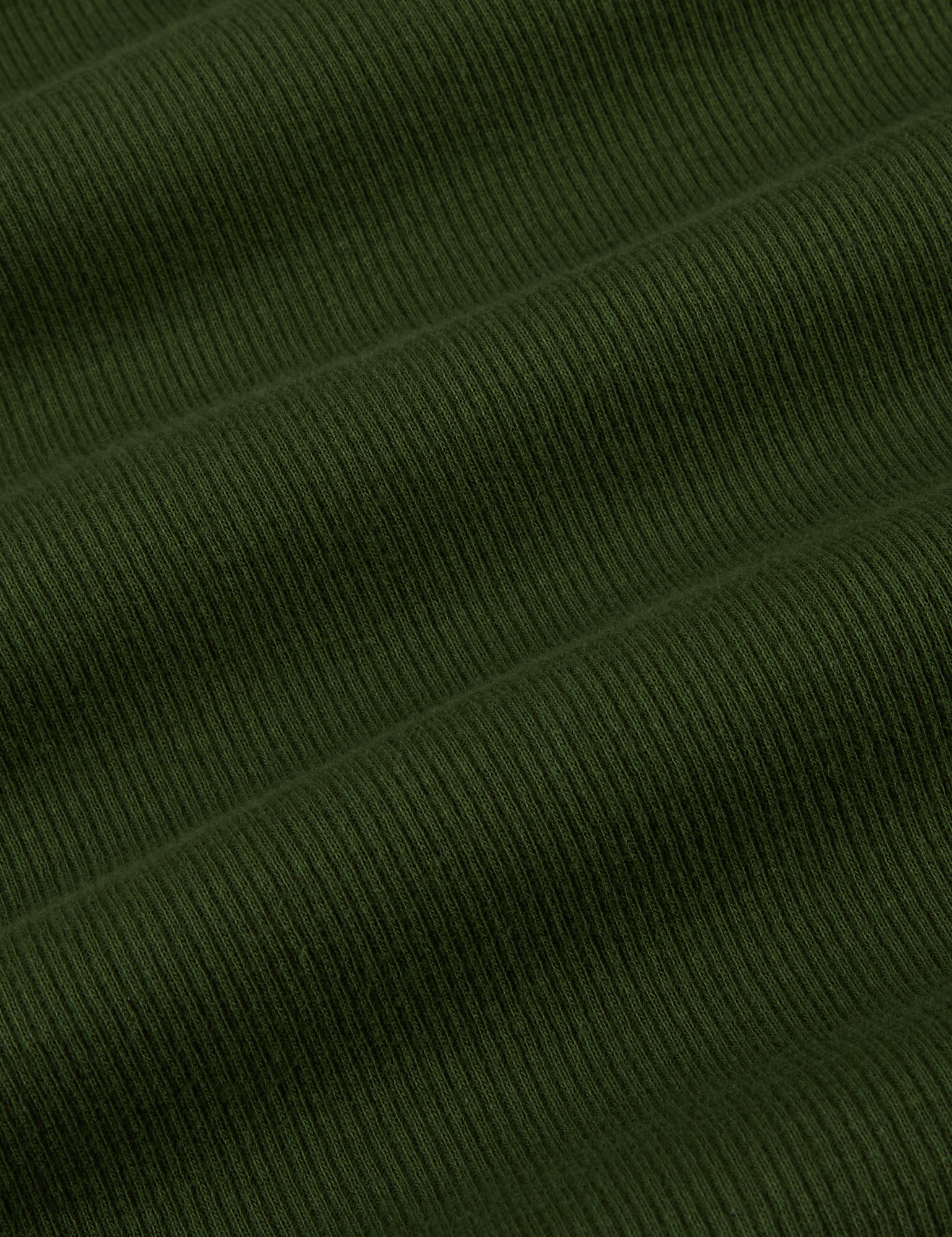 Muscle Tee in Evergreen fabric detail close up