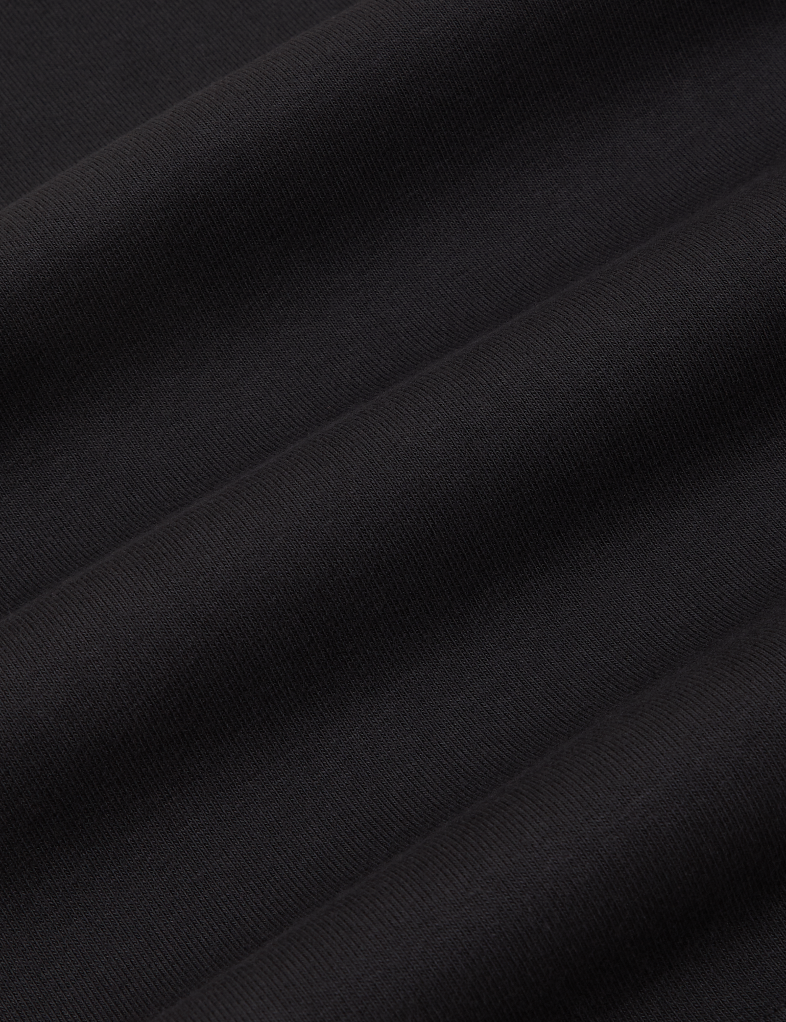 Racerback Tank in Basic Black fabric detail close up
