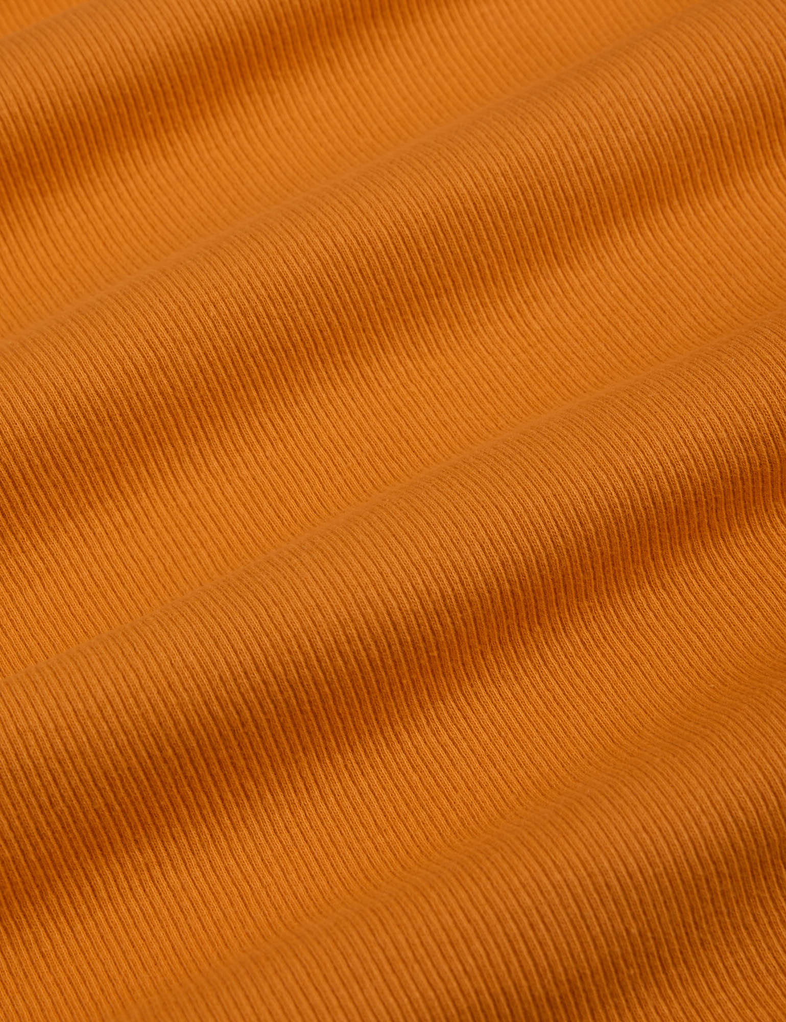 Muscle Tee in Creamsicle Orange fabric detail close up