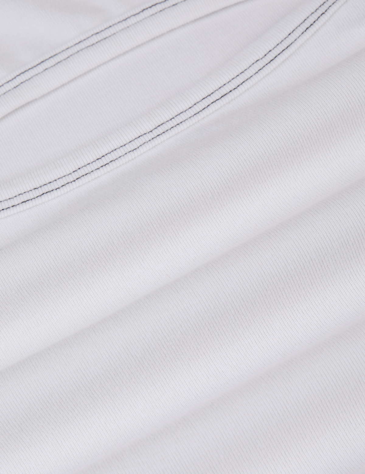 Porthole Tank in Vintage Tee White fabric detail close up