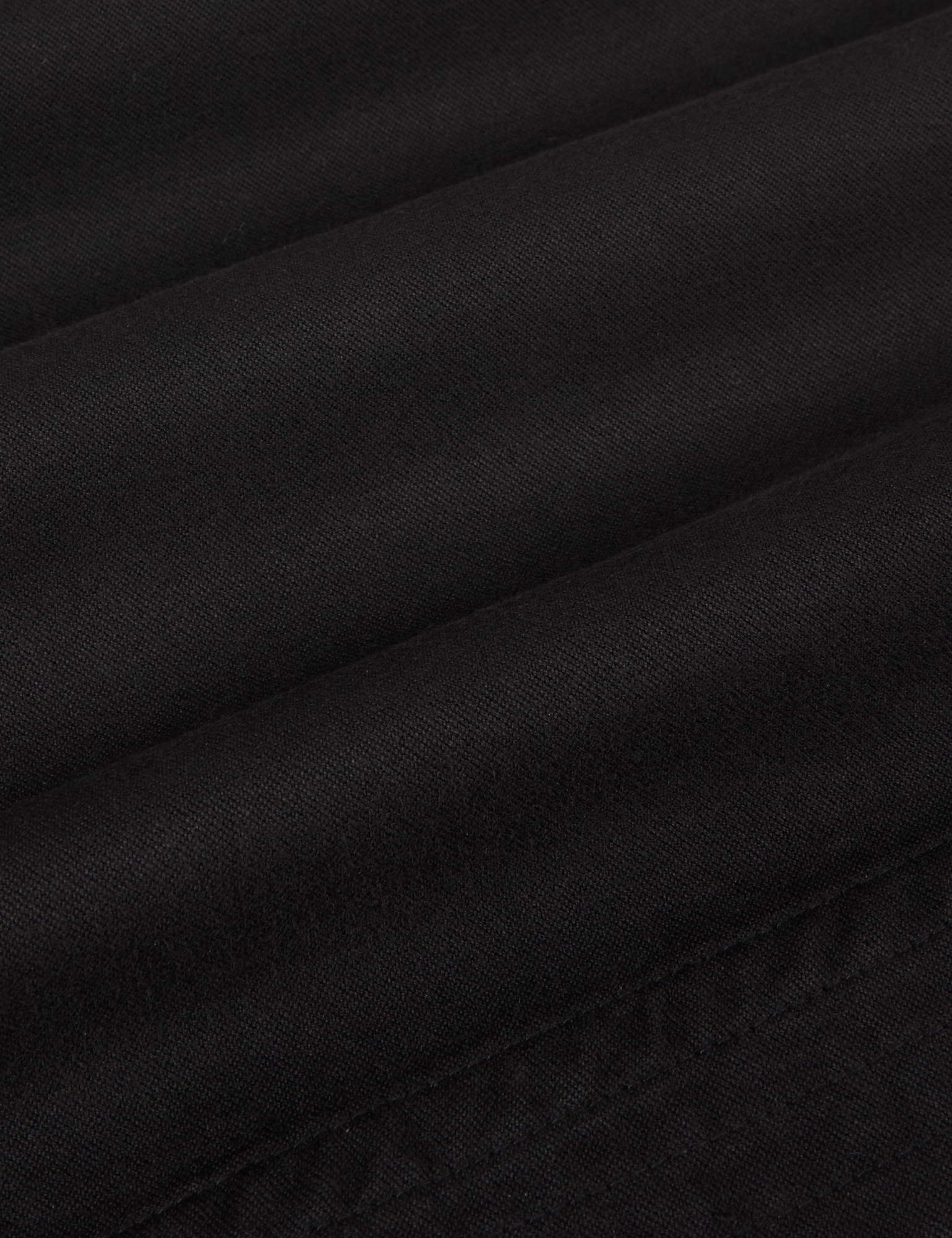 Organic Action Pants in Basic Black fabric detail close up