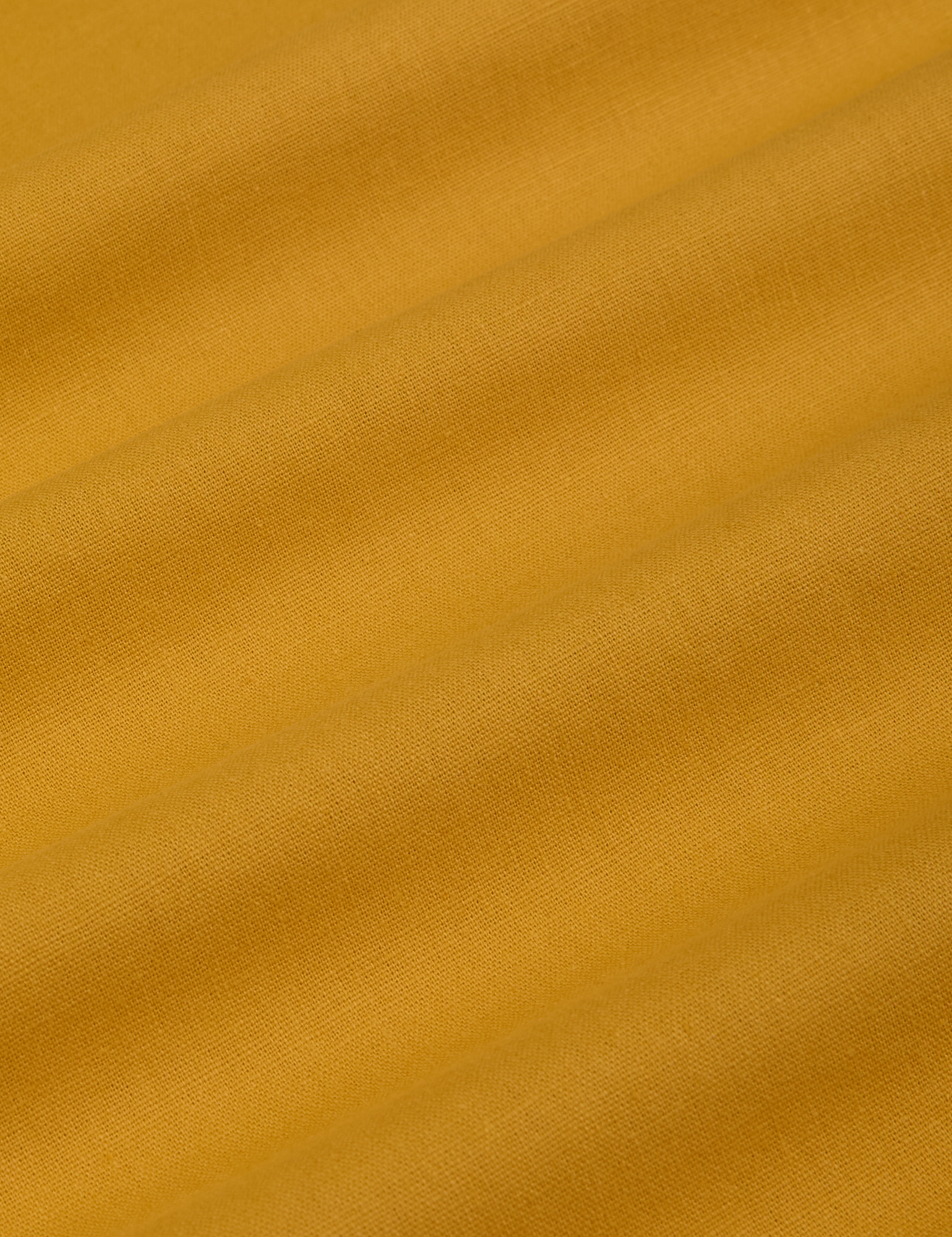 Pantry Button-Up in Mustard Yellow fabric detail close up