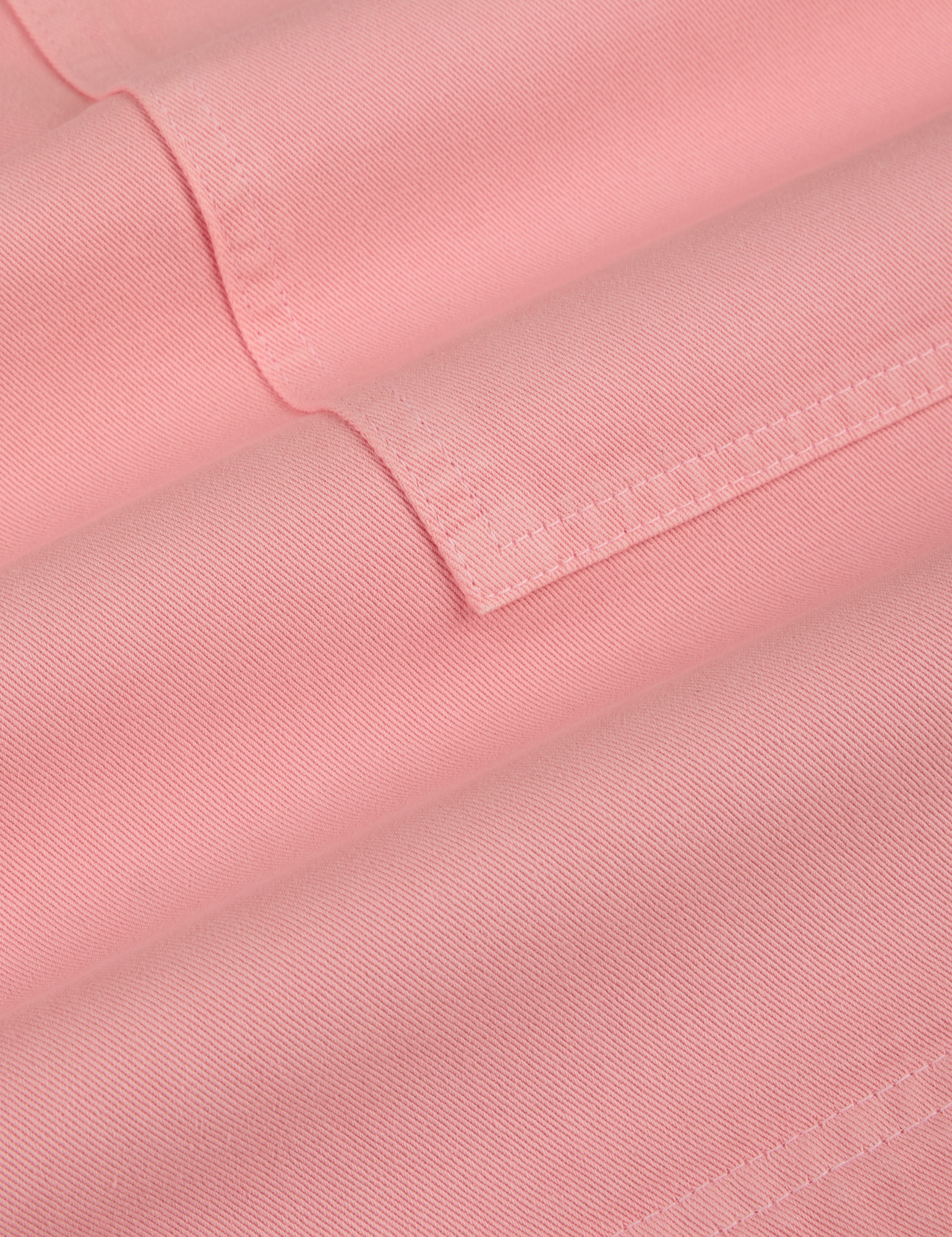 Longline Work Shorts in Baby Pink fabric detail close up