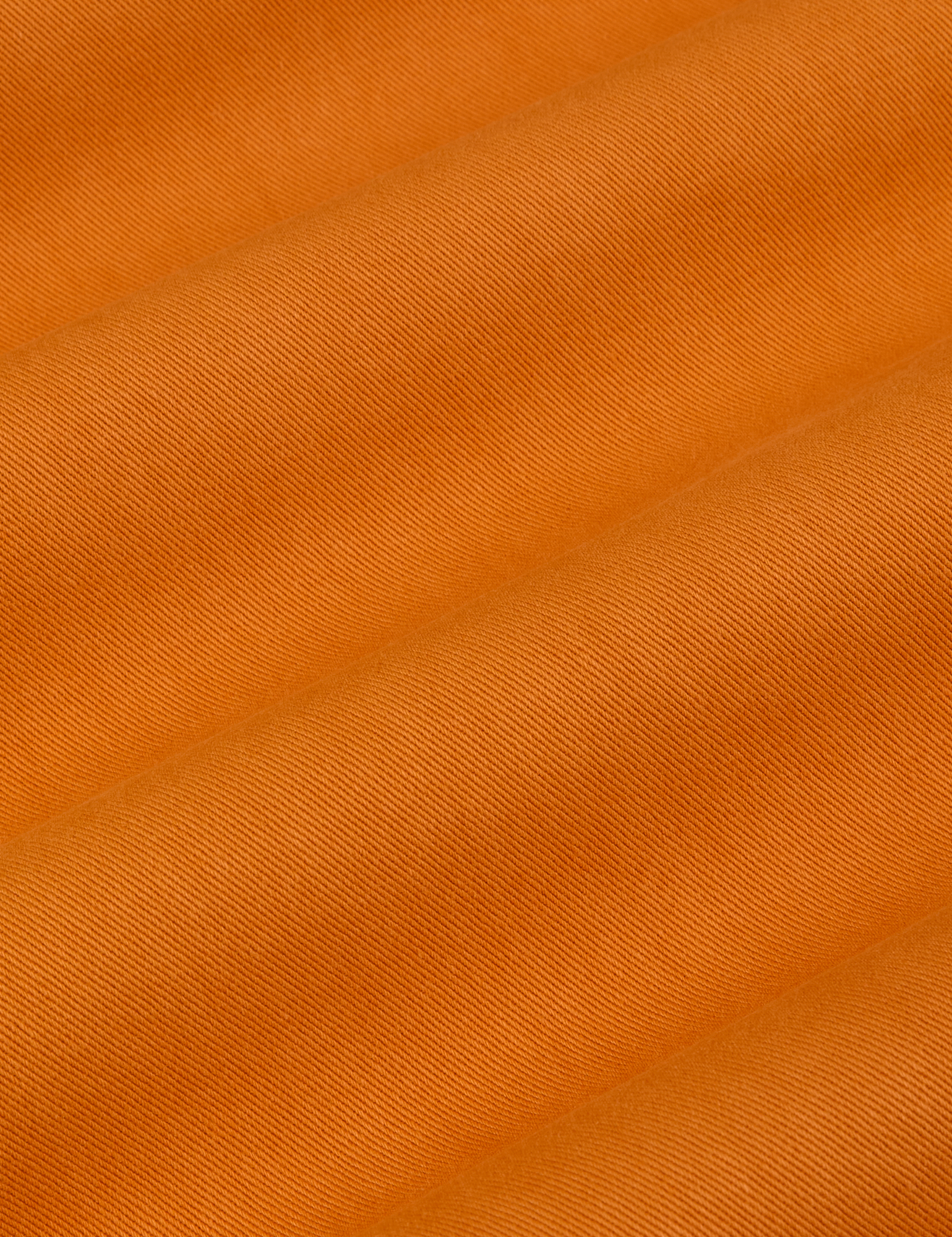 Work Pants in Creamsicle Orange fabric detail close up