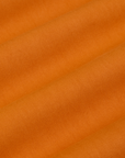 Work Pants in Creamsicle Orange fabric detail close up
