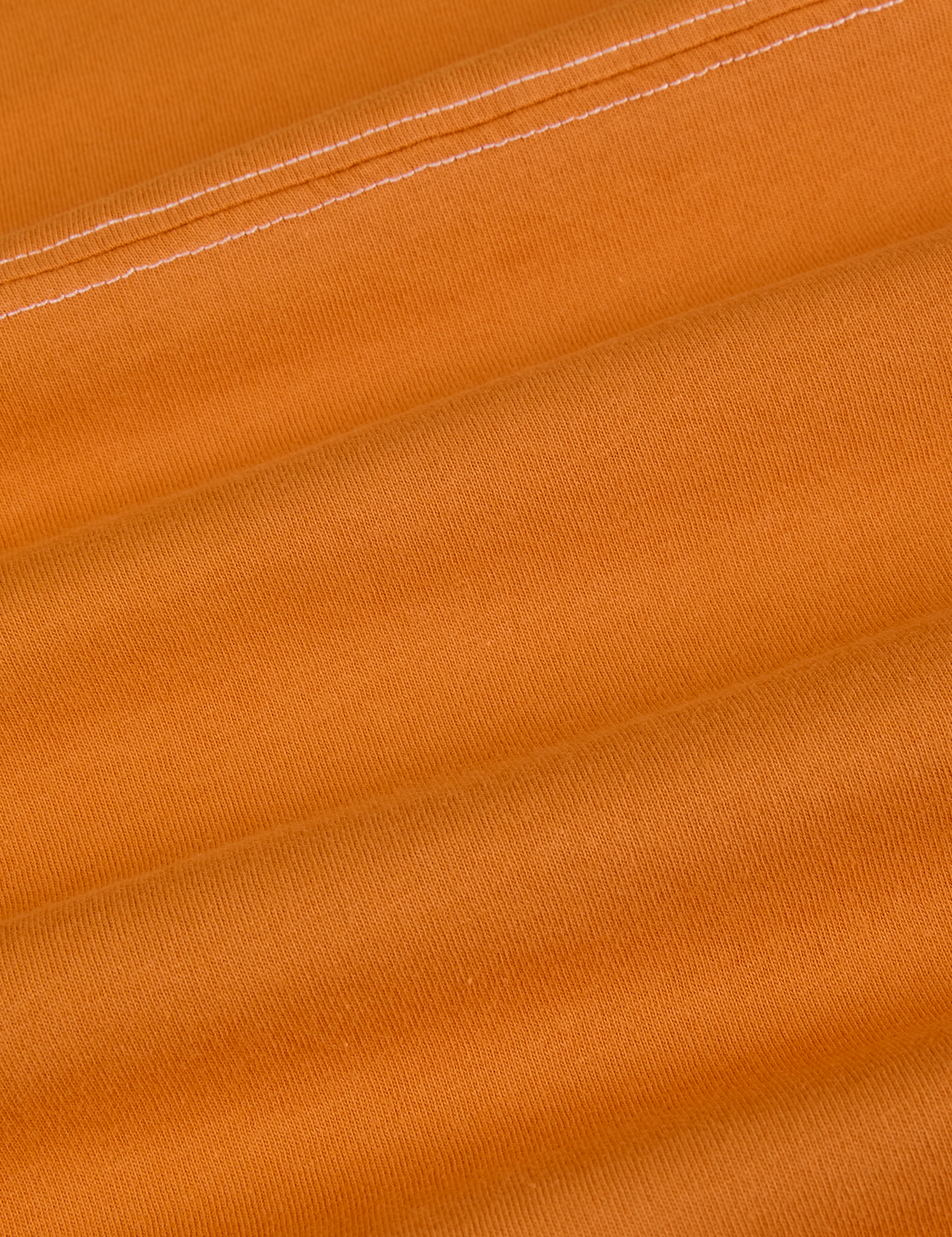 Jr. Varsity Tee in Creamsicle Orange fabric detail close up