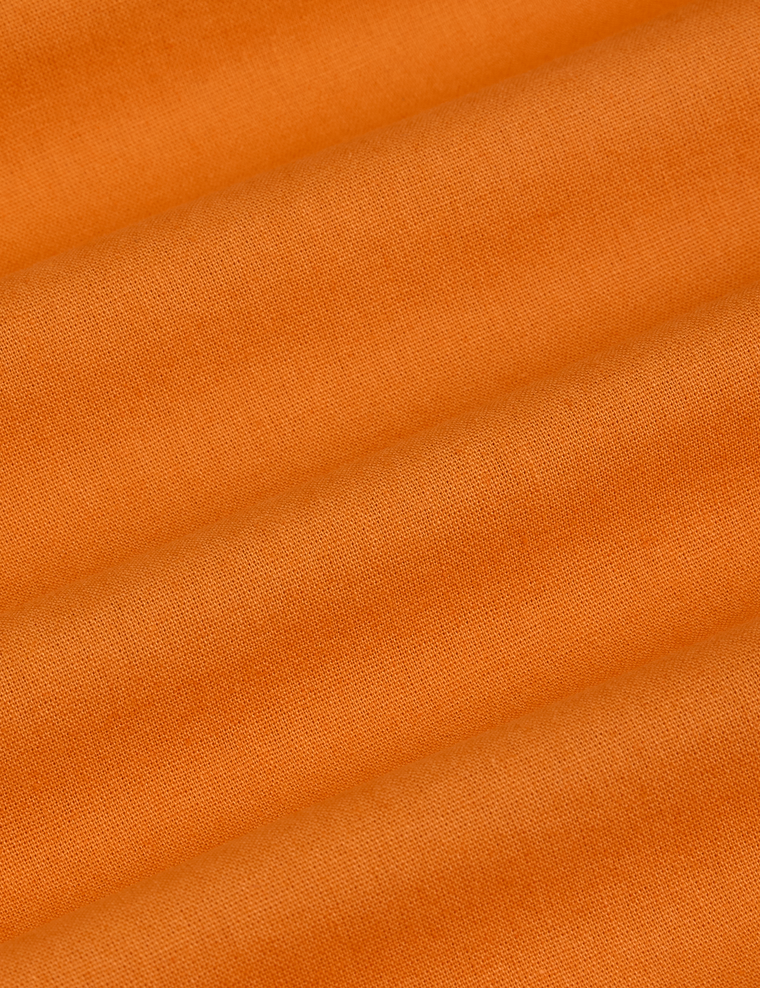 Pantry Button-Up in Creamsicle Orange fabric detail close up