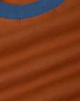 Vintage Ringer Tee in Burnt Terracotta fabric detail close up with french blue neckline