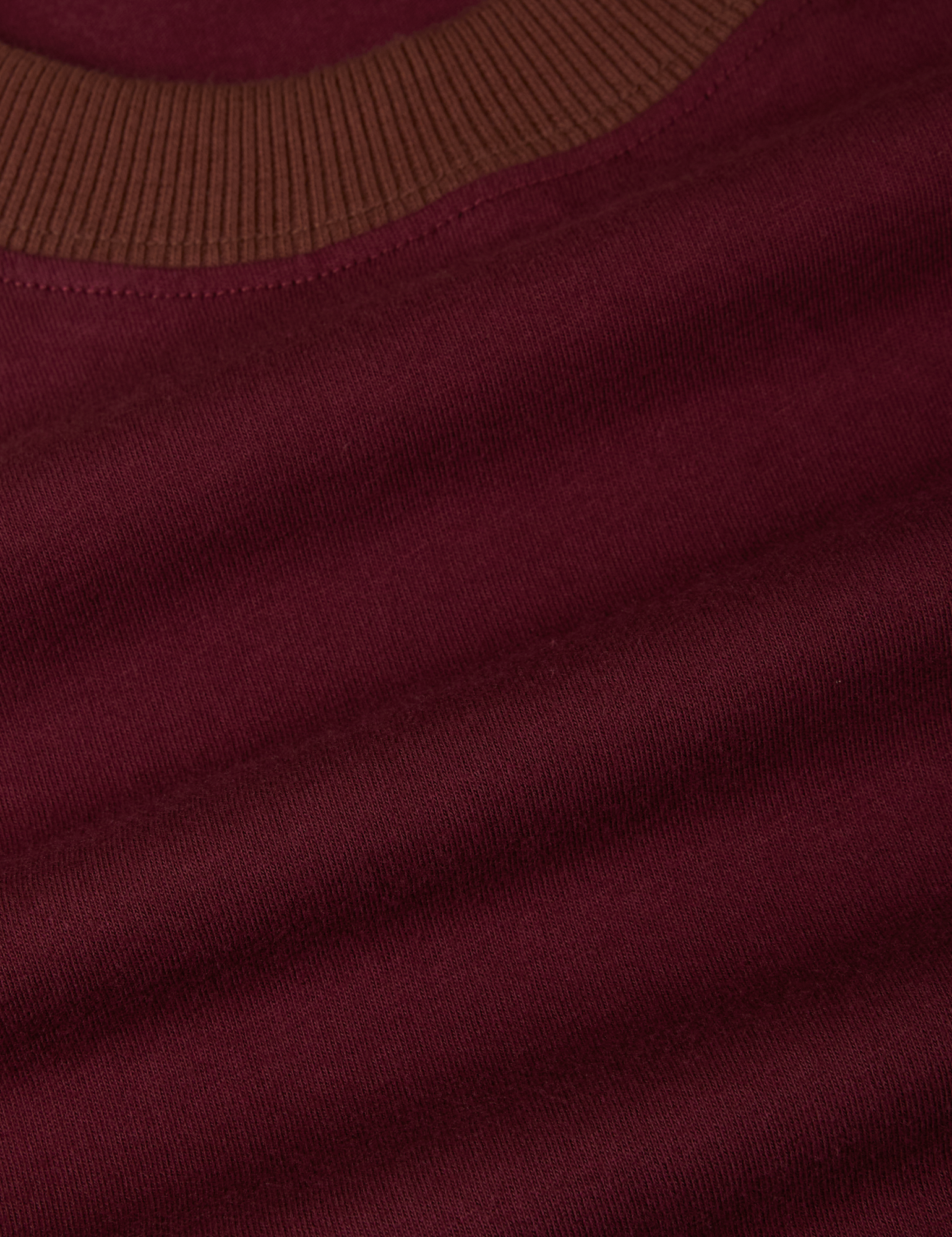 Vintage Ringer Tee in Red Wine fabric detail close up with fudgesicle brown neckline