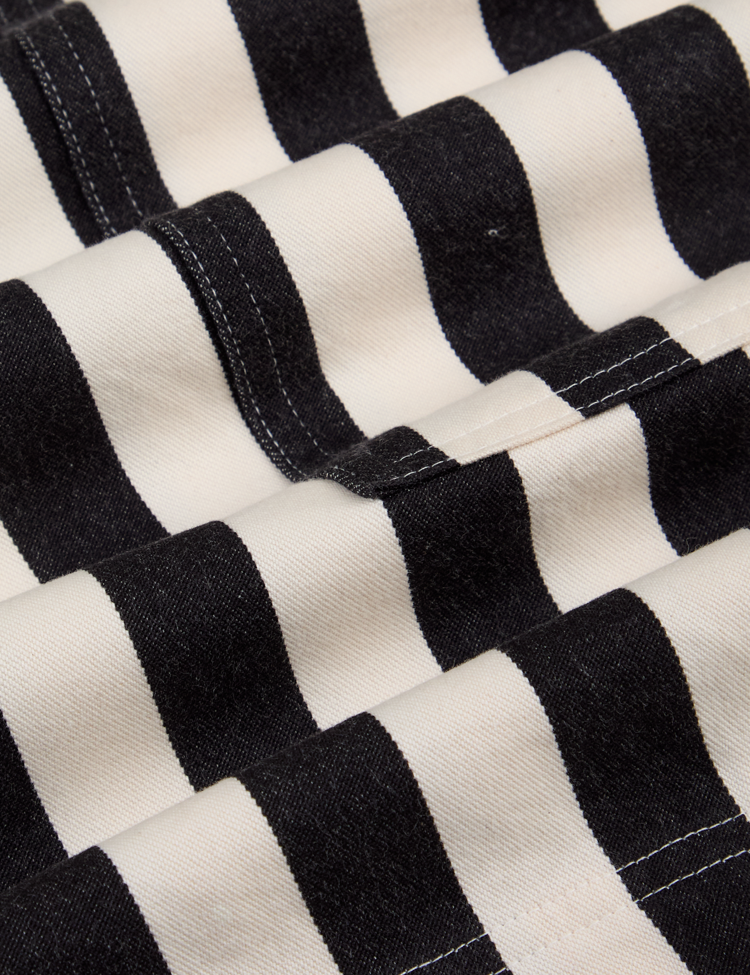 Longline Work Shorts in Natural fabric detail close up