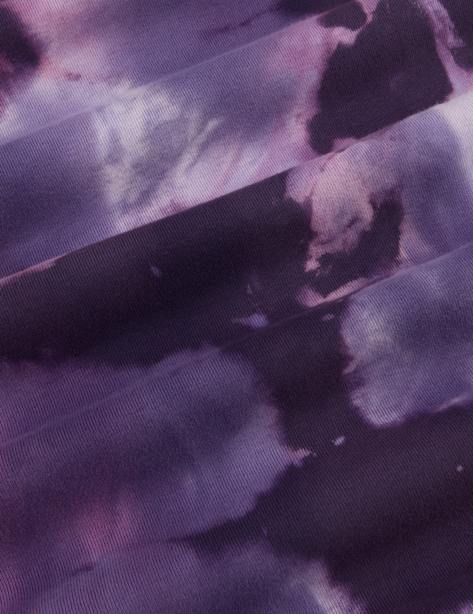 Long Sleeve Baby Tee in Dark Lavender fabric detail close up. Shades of purple tie dye.
