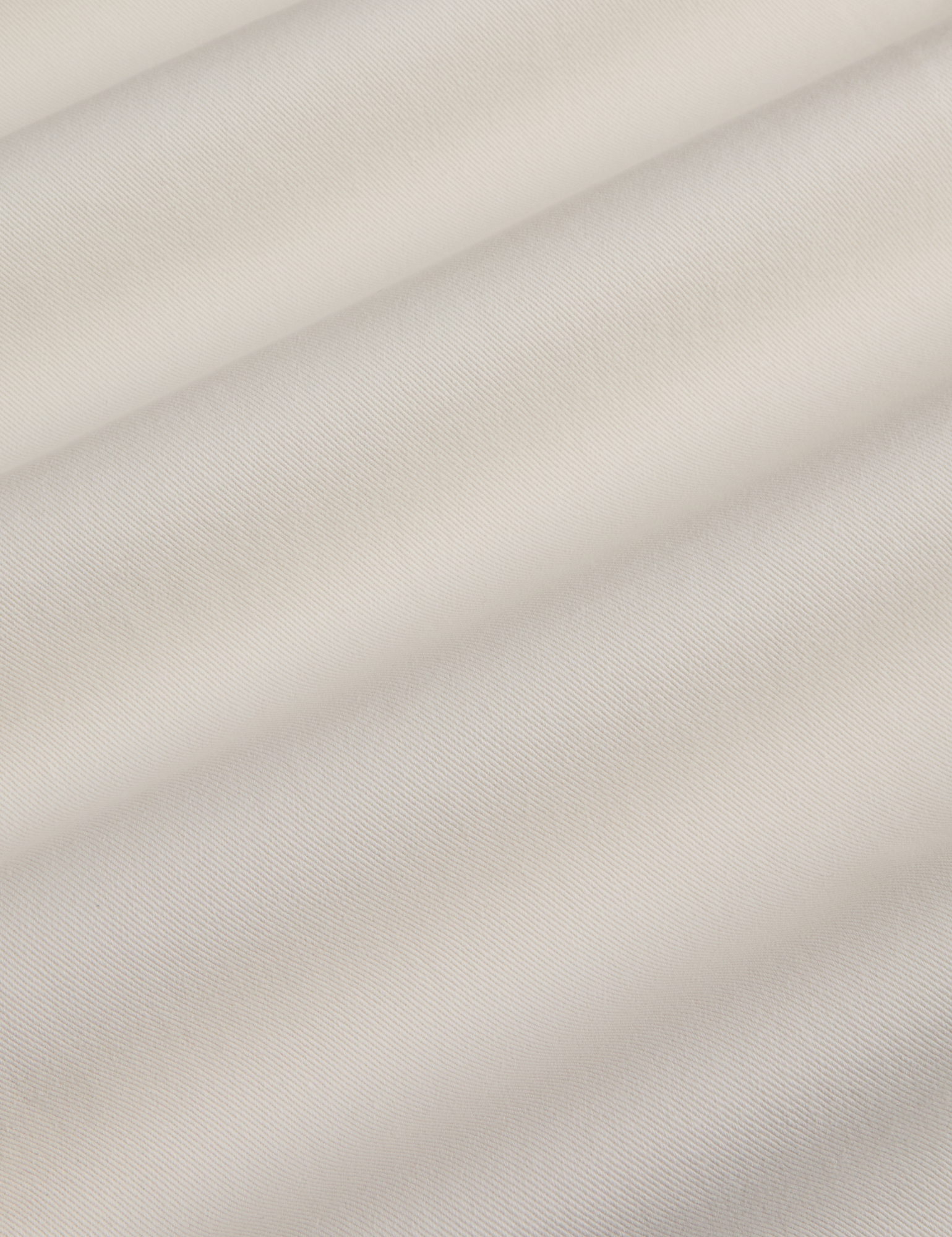 Short Sleeve Jumpsuit in Vintage Tee White fabric detail close up
