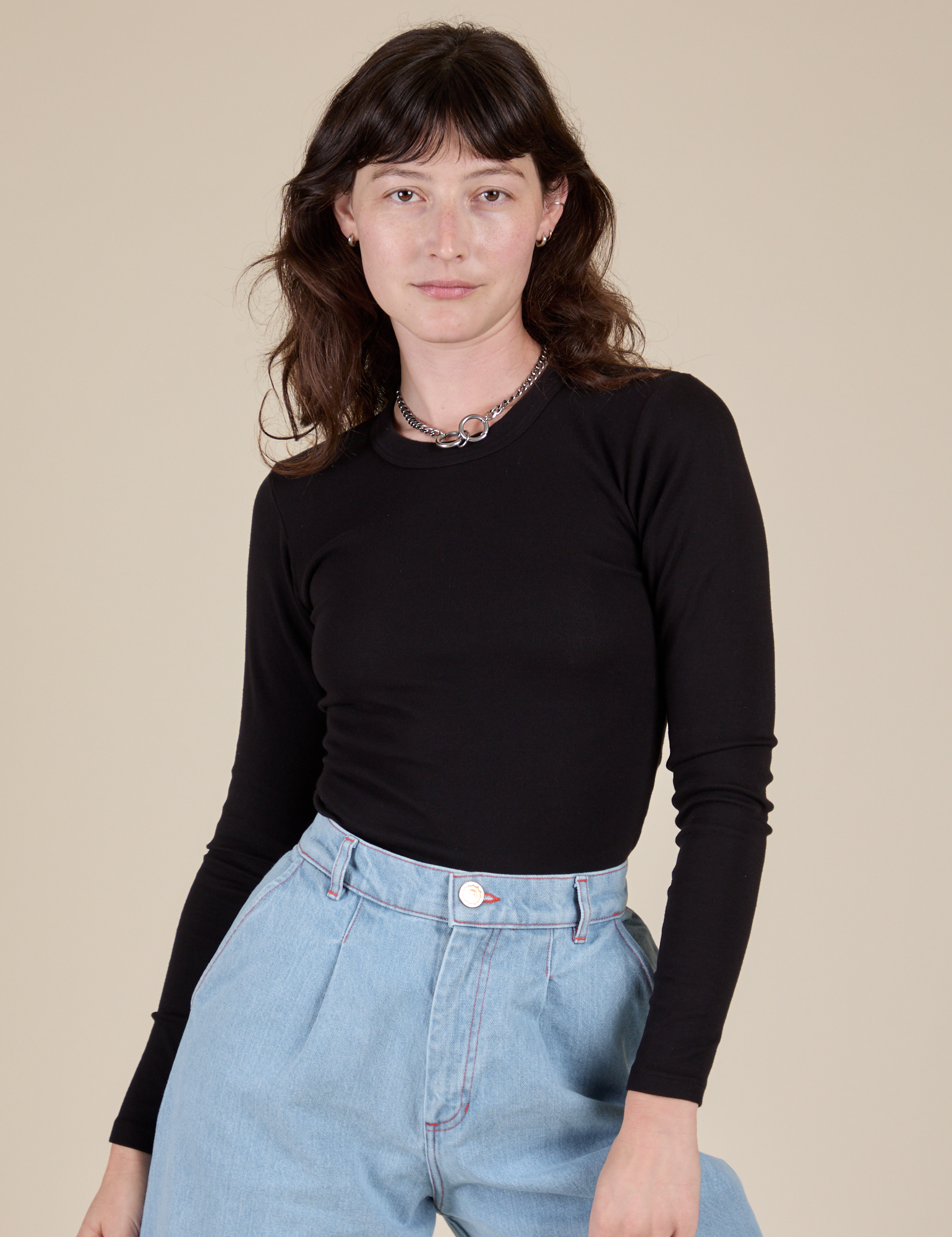 Alex is 5’8” and wearing P Long Sleeve Baby Tee in Basic Black