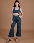 Alex is wearing Action Pants in Lagoon and Mini Tank in Lagoon