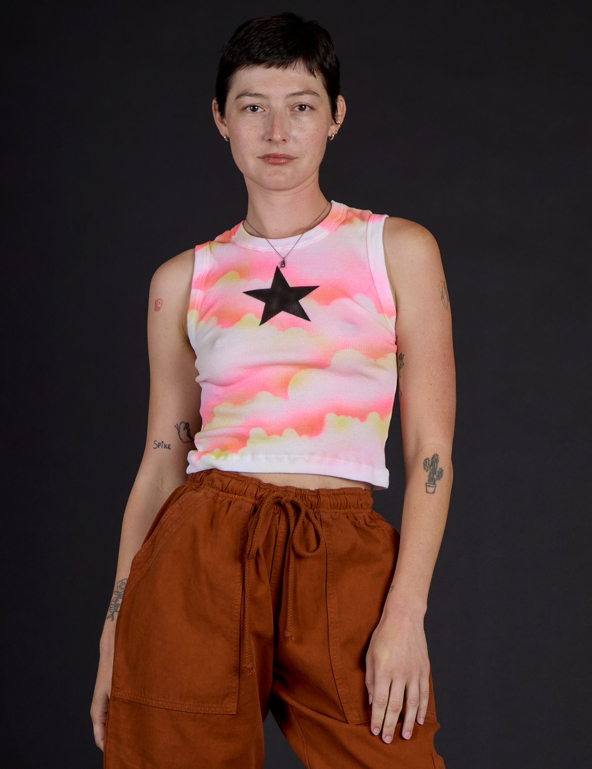 Alex wearing the Black Star Airbrush Muscle Tee