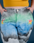 Work Pants in Night Sky Airbrush front close up with Ashley's hands in both pockets