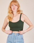 Margaret is wearing Cropped Cami in Swamp Green
