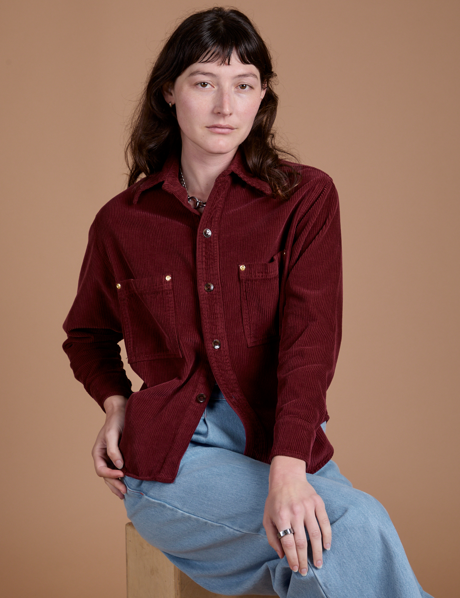 Alex is wearing Cropped Corduroy Overshirt in Red Wine