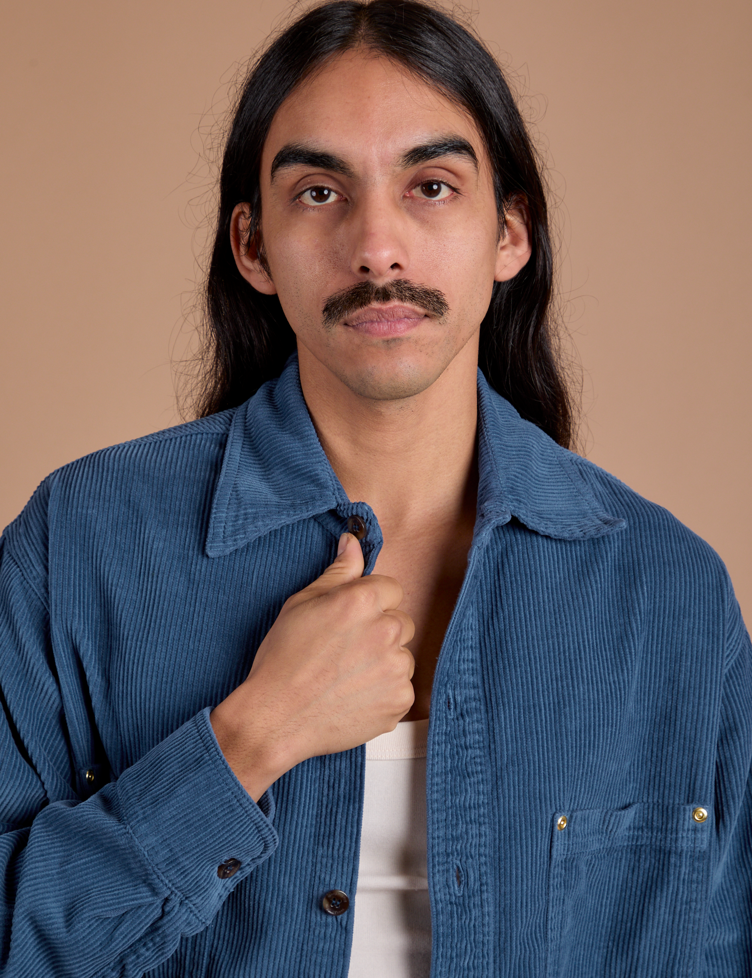 Cropped Corduroy Overshirt in French Blue close up on Anthony