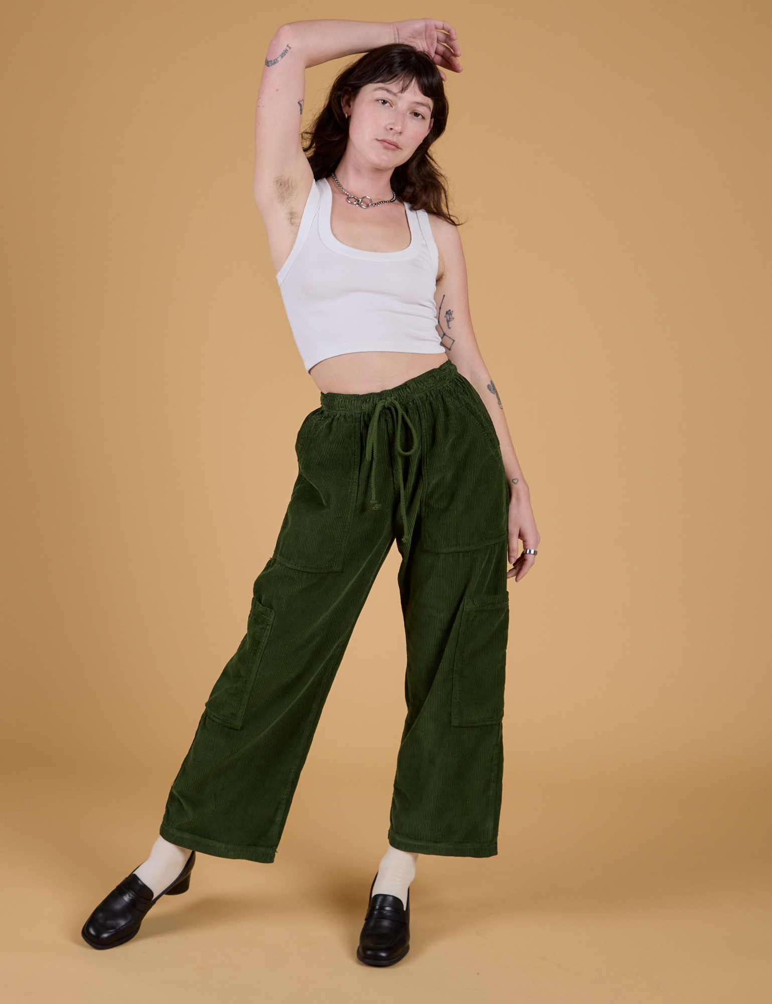 Corduroy Drop Pocket Cargo Pants in Evergreen and Cropped Tank in Vintage Tee White on Alex