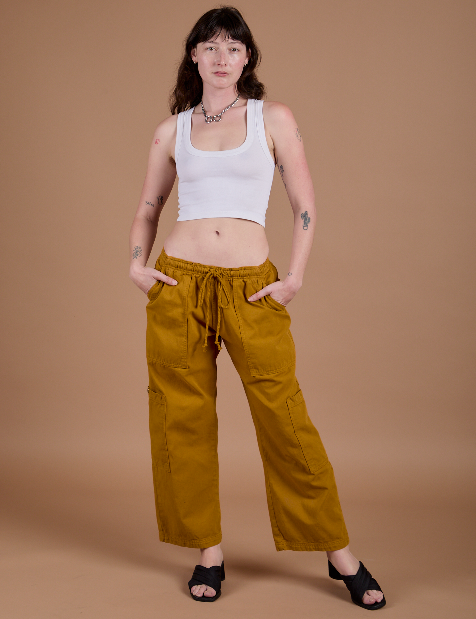 Drop Pocket Cargo Pants in Spicy Mustard and Cropped Tank in Vintage Tee White on Alex