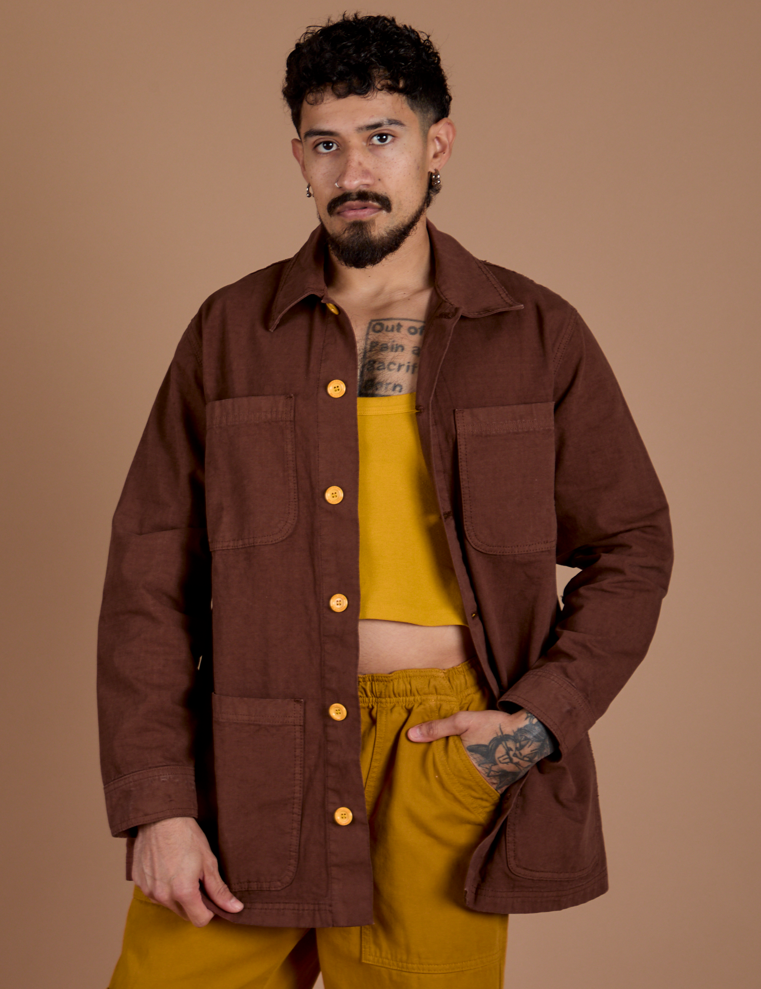 Jesse is 5'8" and wearing XS Ripstop Field Coat in Fudgesicle Brown