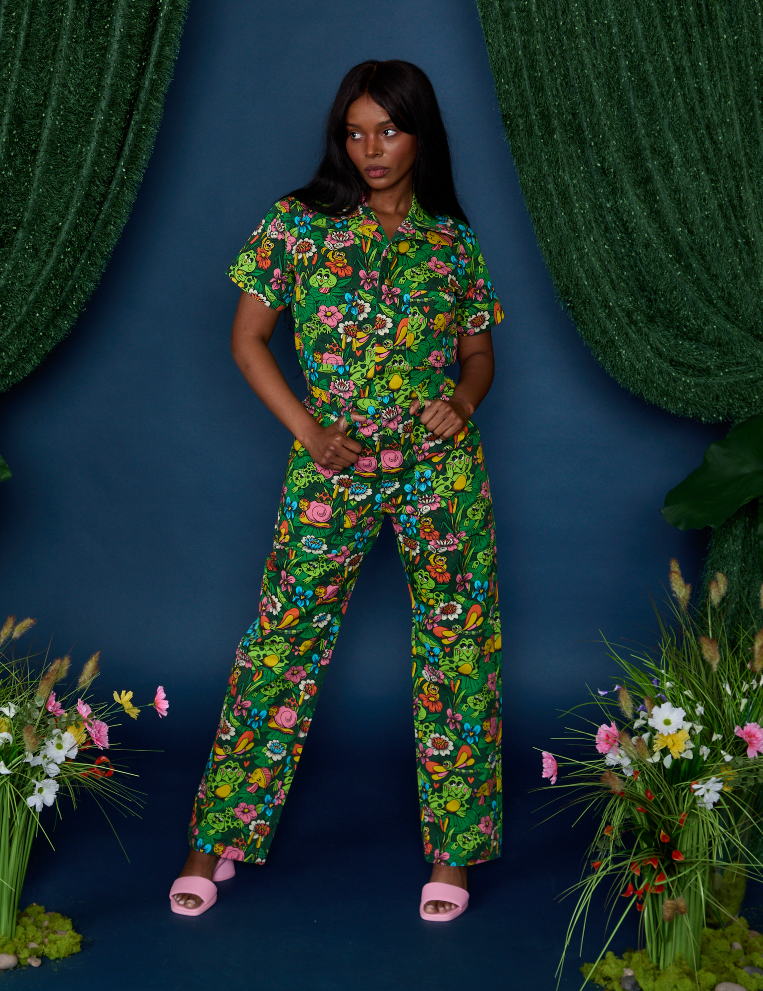 Kandia is 5'3" and wearing P Pond Party Print Jumpsuit