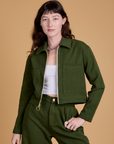 Alex is 5’8” and wearing P Heritage Mechanic Jacket in Evergreen