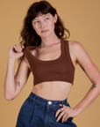 Alex is 5’8” and wearing P Mini Tank in Fudgesicle Brown