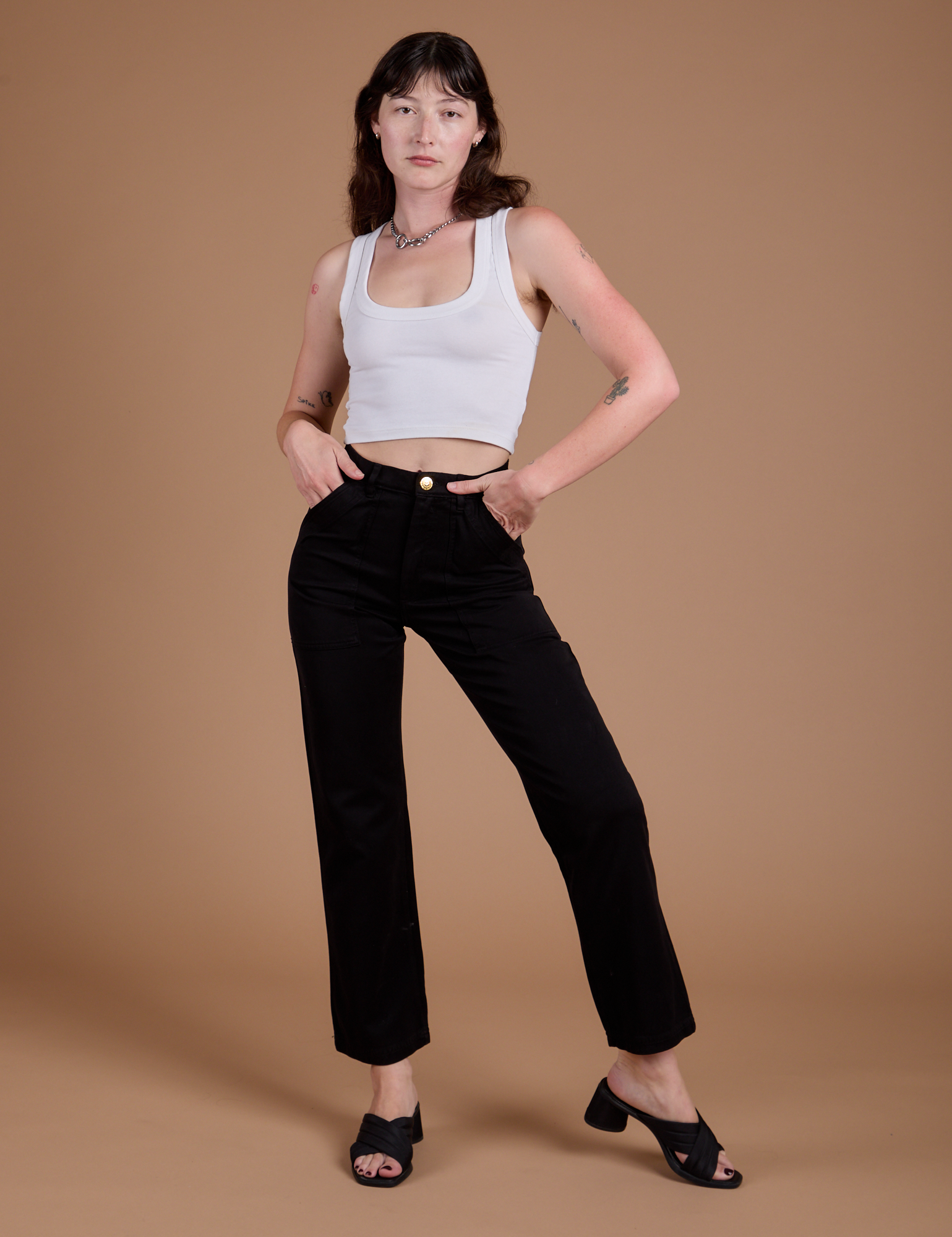 Organic Work Pants in Basic Black and vintage tee white Cropped Tank on Alex