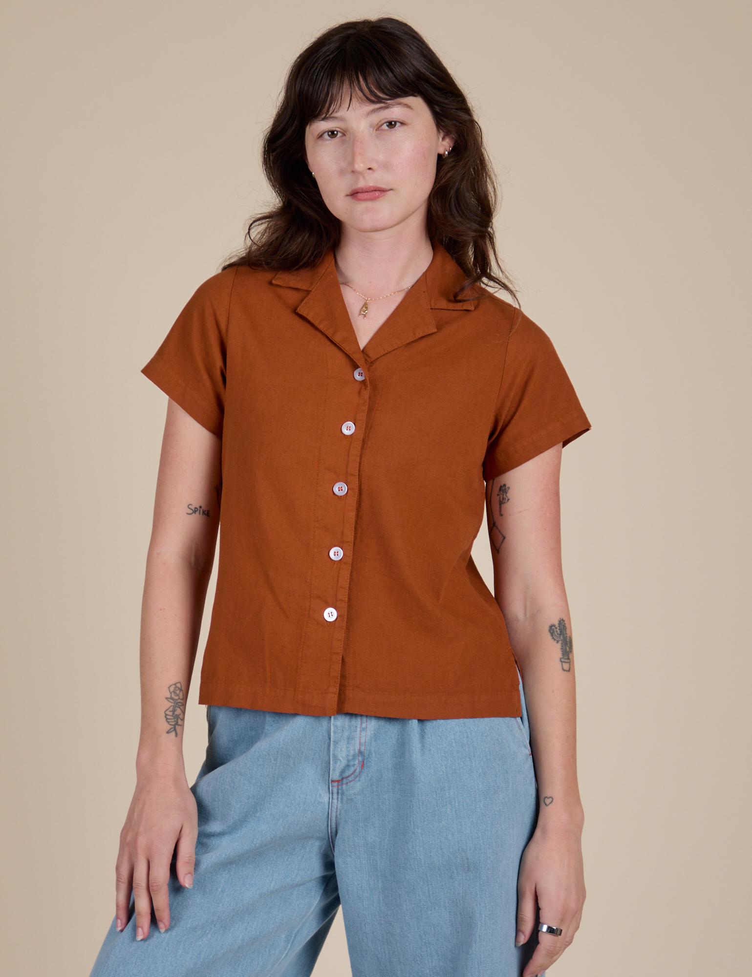 Alex is 5’8” and wearing P Pantry Button-Up in Burnt Terracotta