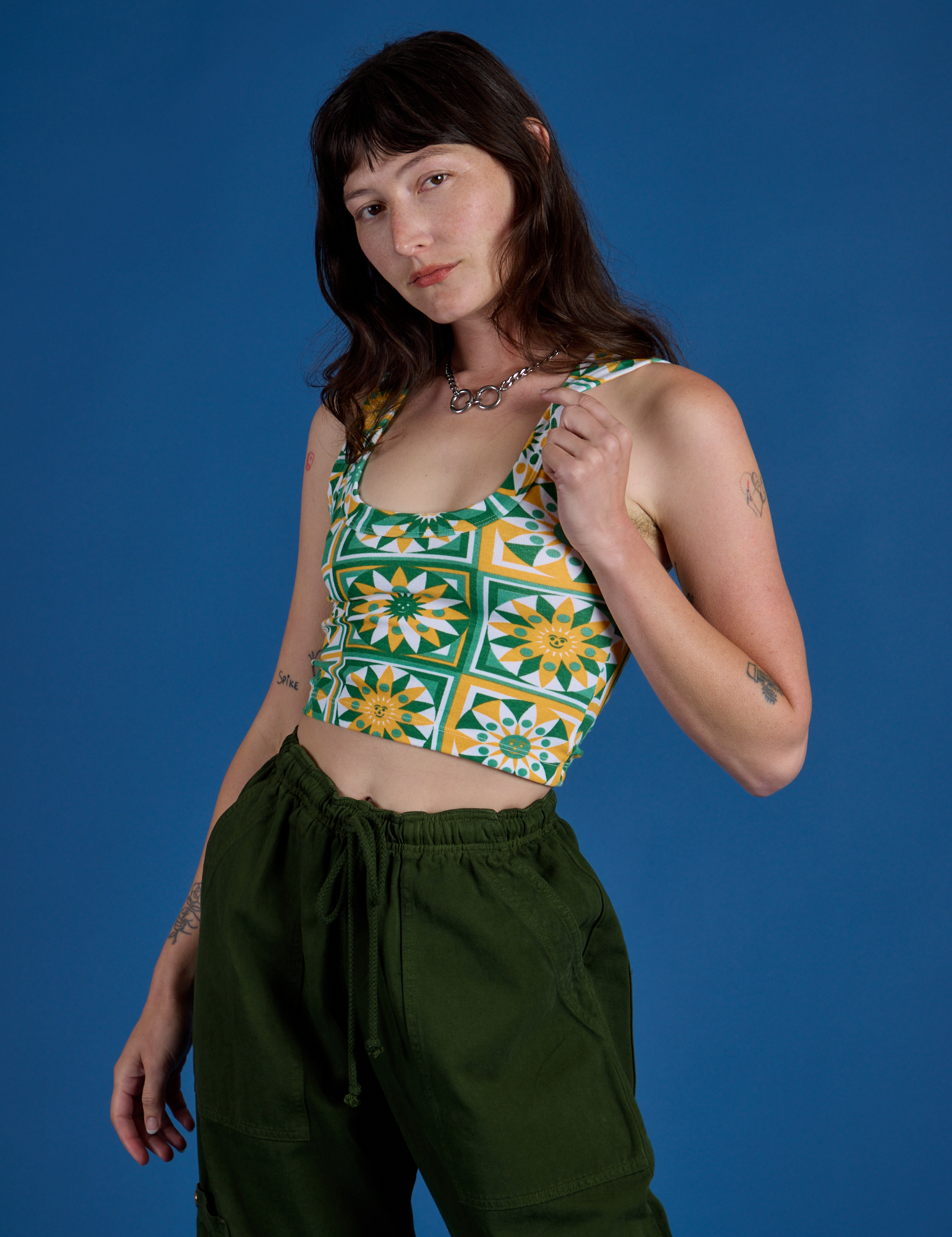 Alex is wearing Cropped Tank Top in Spring Quilt Print