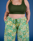 Close up of Drop Pocket Cargo Pants in Spring Quilt Print and evergreen Mini Tank
