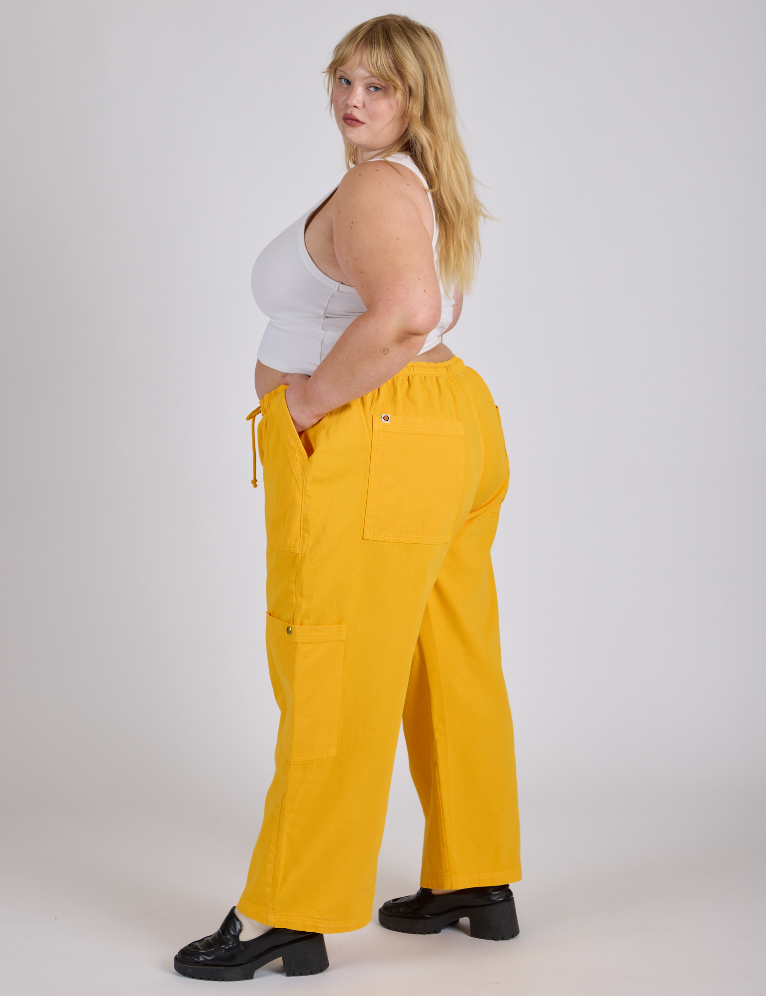 Side view of Drop Pocket Cargo Pants in Sunshine Yellow on Juliet