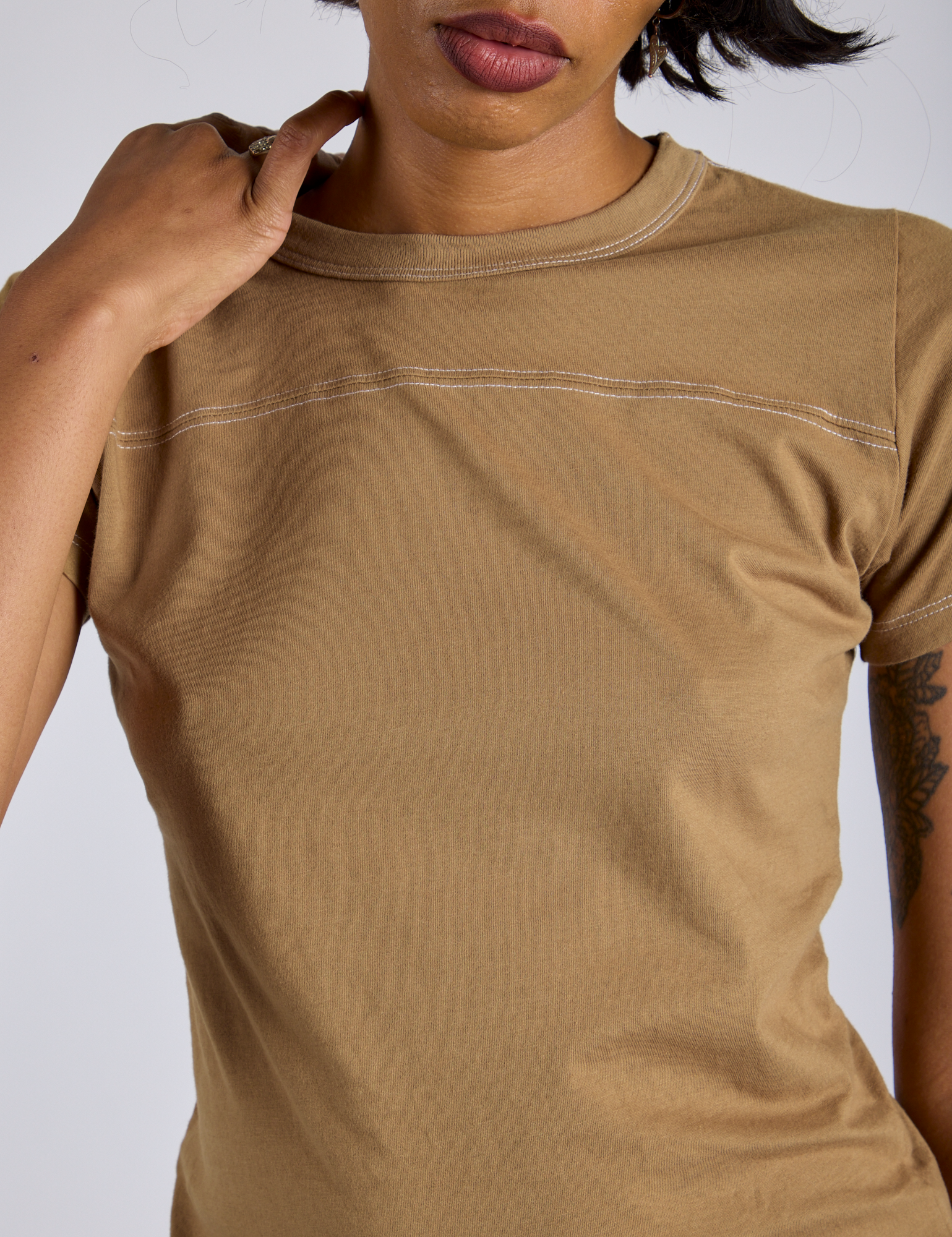 Jr. Varsity Tee in Desert Brown close up on Kira