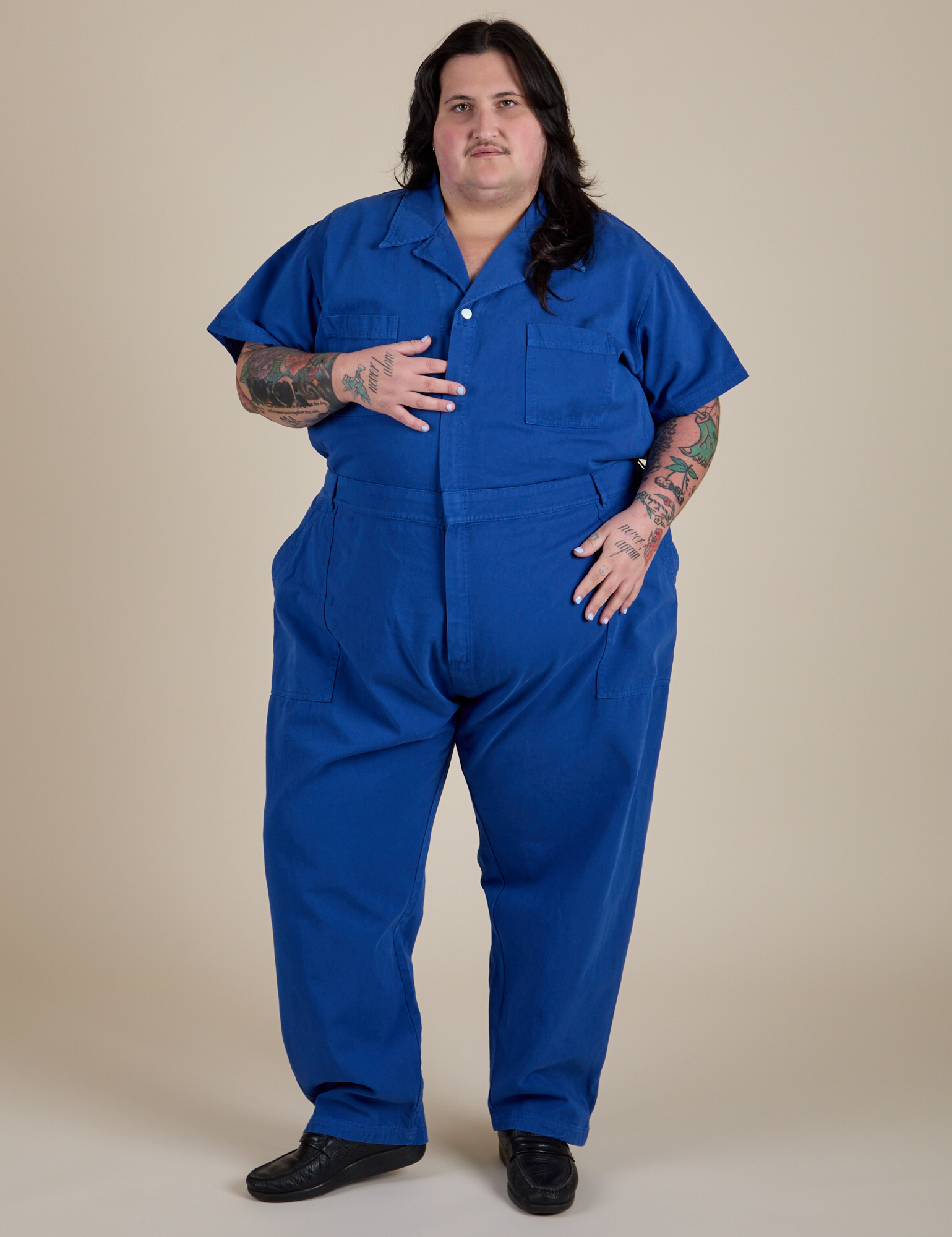 Sam is 5'10" and wearing 4XL Short Sleeve Jumpsuit in Royal Blue
