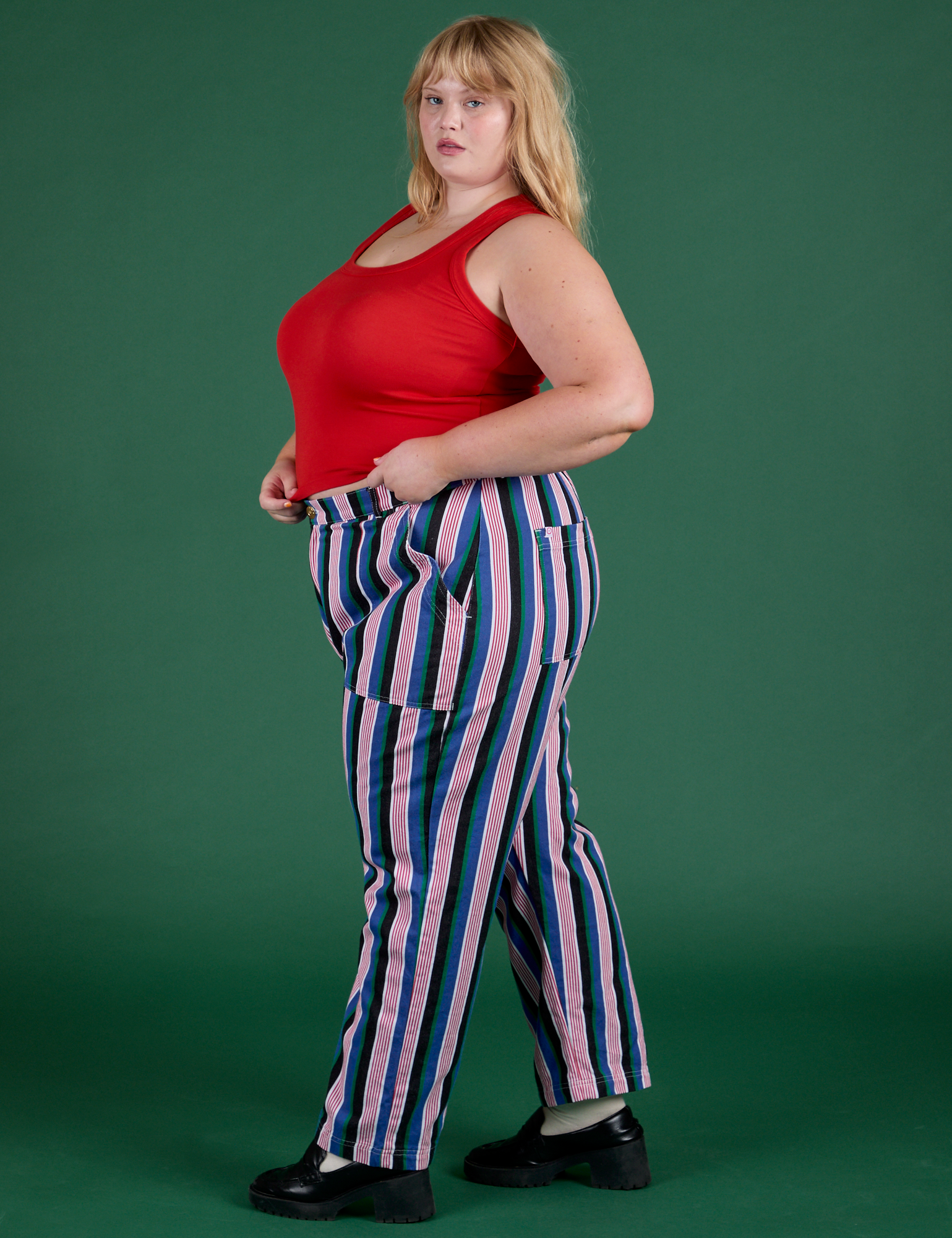 Side view of  Work Pants in Pacific Stripe and mustang red Cropped Tank on Juliet 