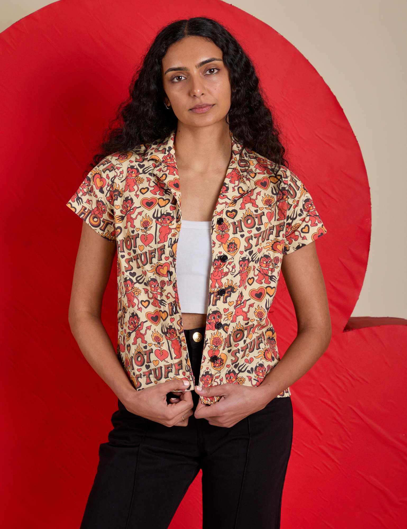 Shahana is 5’10 and wearing XS Hot Stuff Print Pantry Button-Up