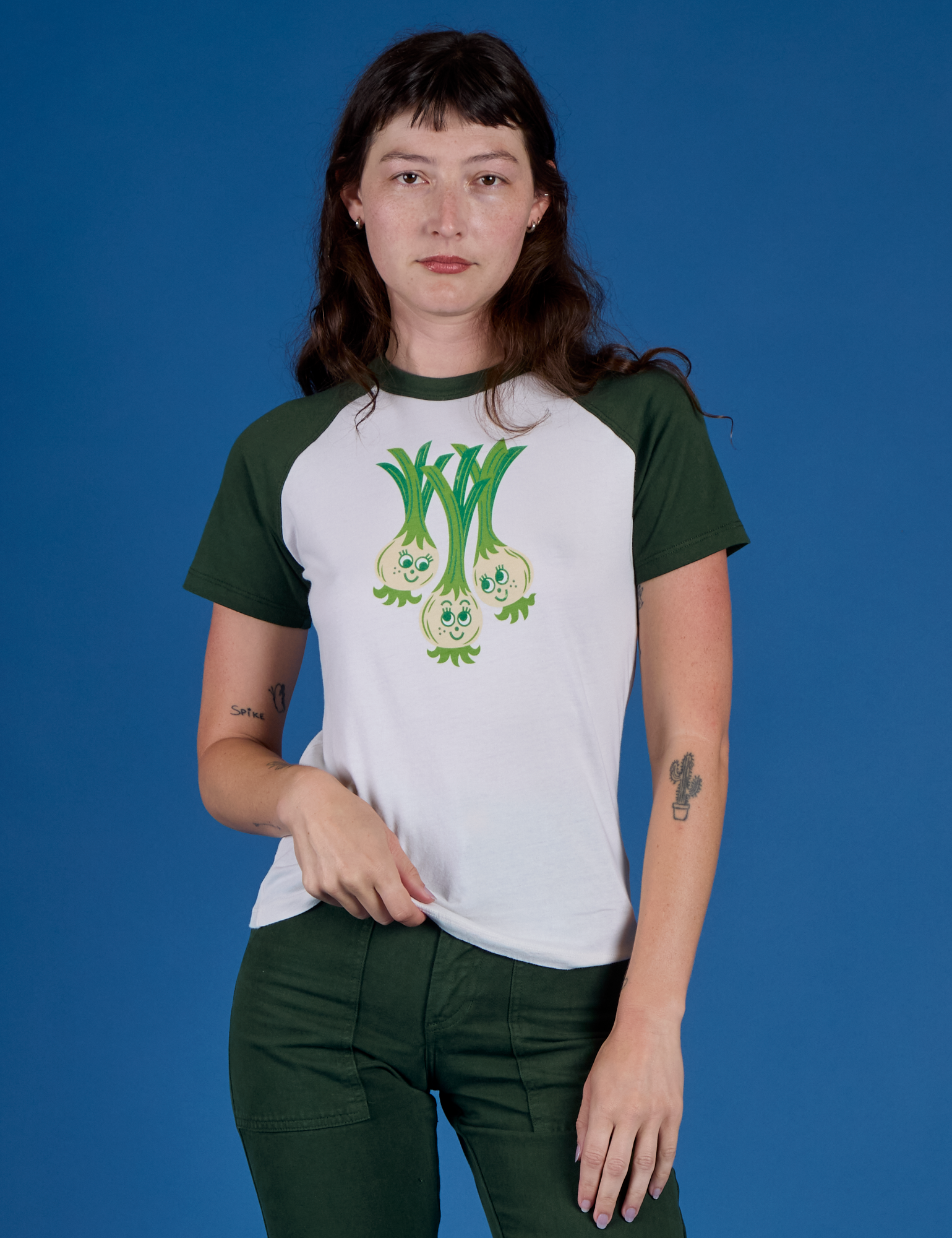 Alex is 5’8” and wearing P Produce Raglan Tee in Scallions