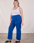 Angled front view of Western Pants in Royal Blue and Cropped Tank in Vintage Tee Off-White on Lish