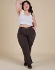 Ashley is wearing Work Pants in Espresso Brown and Cropped Tank in Vintage Tee White