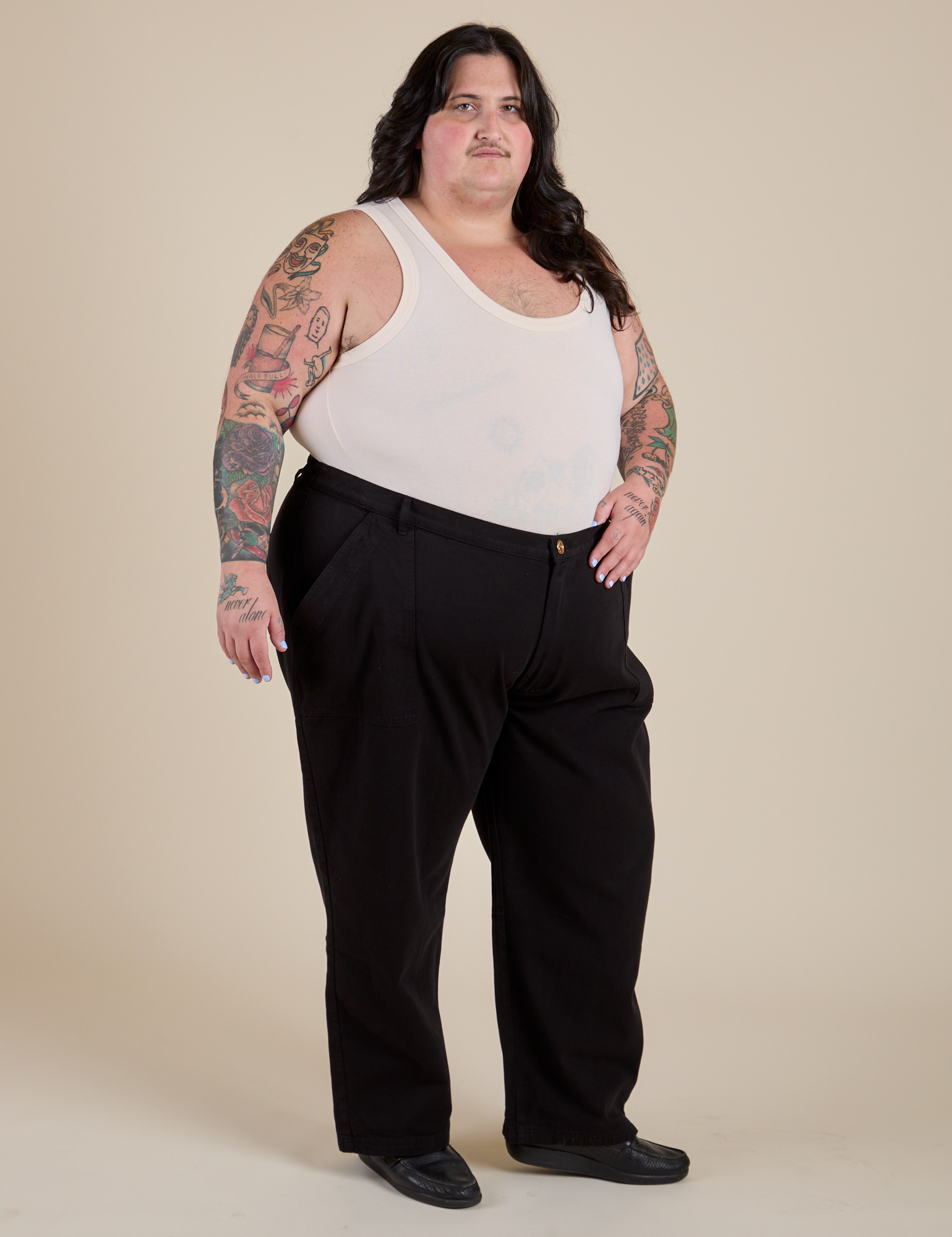 Angled front view of Work Pants in Basic Black and Tank Top in Vintage Tee Off-White on Sam