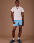 Jerrod is 6'3" and wearing M Classic Work Shorts in Baby Blue paired with a vintage off white Organic Vintage Tee