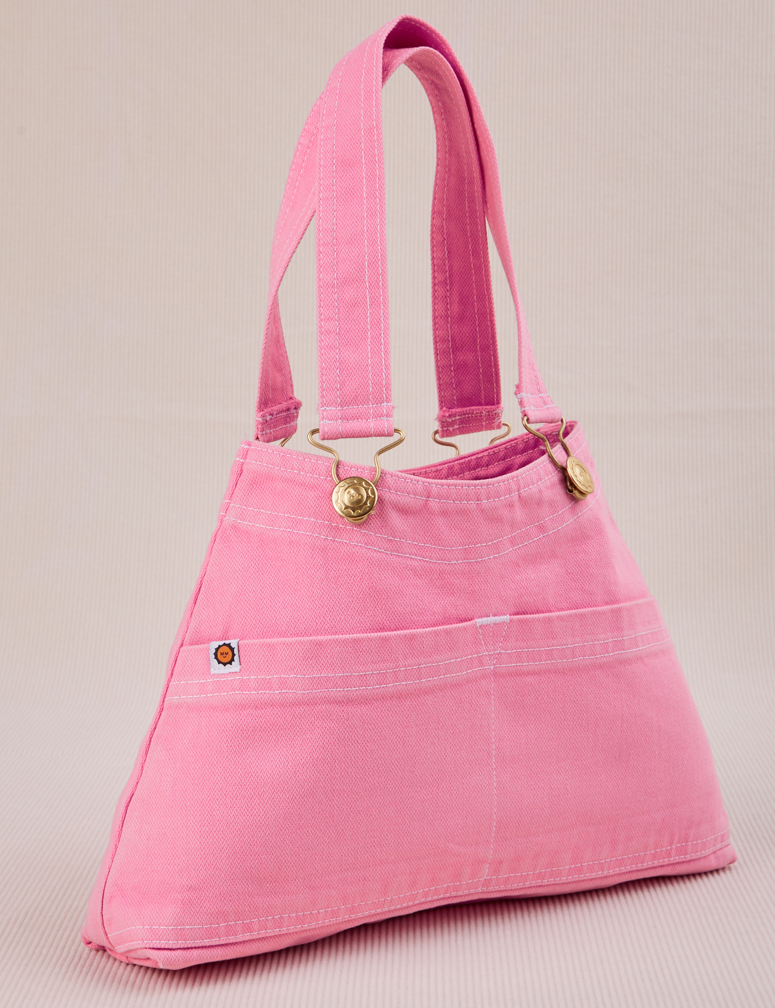 Overall Handbag in Bubblegum Pink angled view